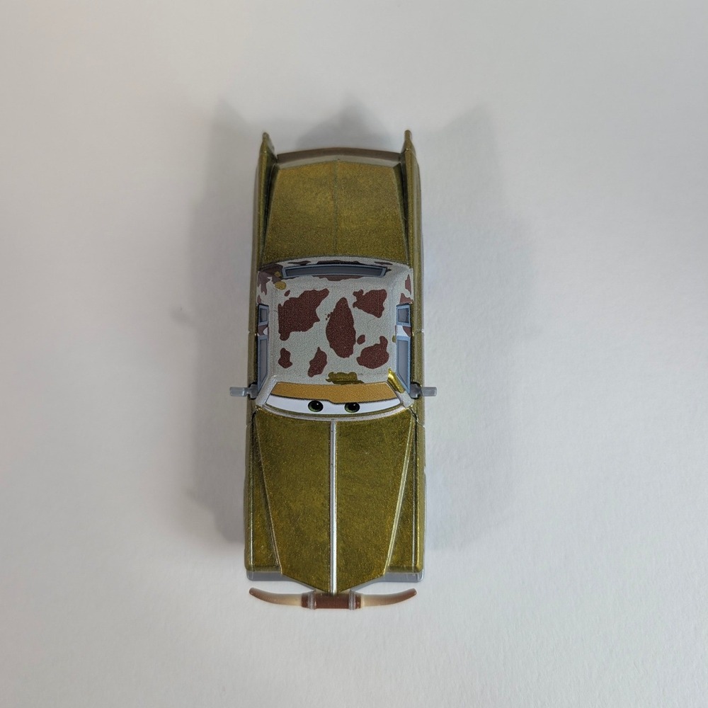Disney Pixar Cars Tex Dinoco Gold Cadillac Diecast Toy Car Longhorns Mattel - Picture 6 of 8